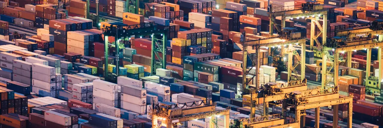 Container terminal seen from above, with yard cranes